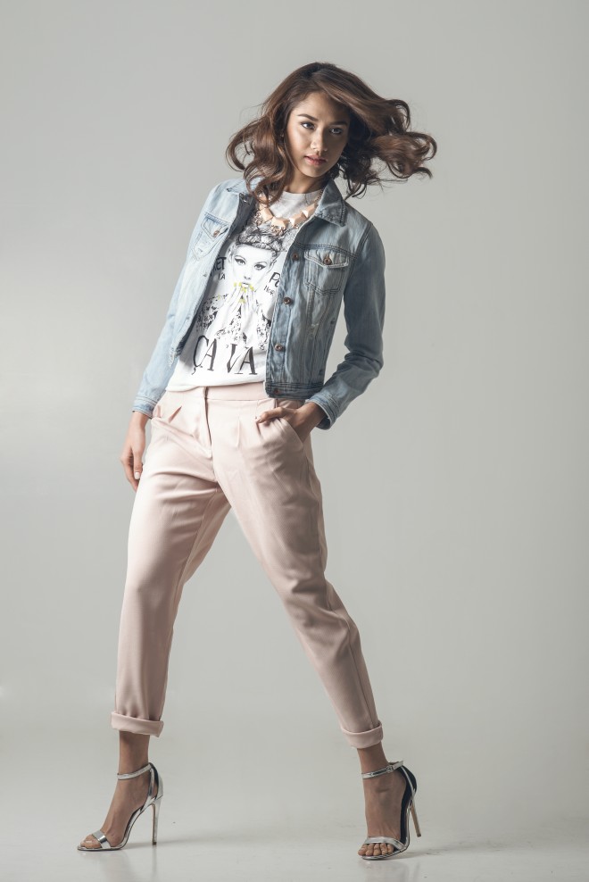 Dress down your slacks by wearing it with this light wash denim jacket and graphic shirt.