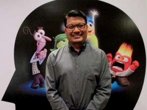 RONNIE del Carmen and the characters of Inside Out. WALT DISNEY STUDIOS