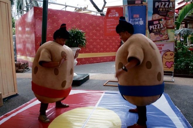 SUMO SPUDS. Don sumo spud wrestler costumes and get a chance to win prizes.