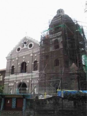 Sta. Ana church at present with its restored façade and conservation works ongoing for its belfry