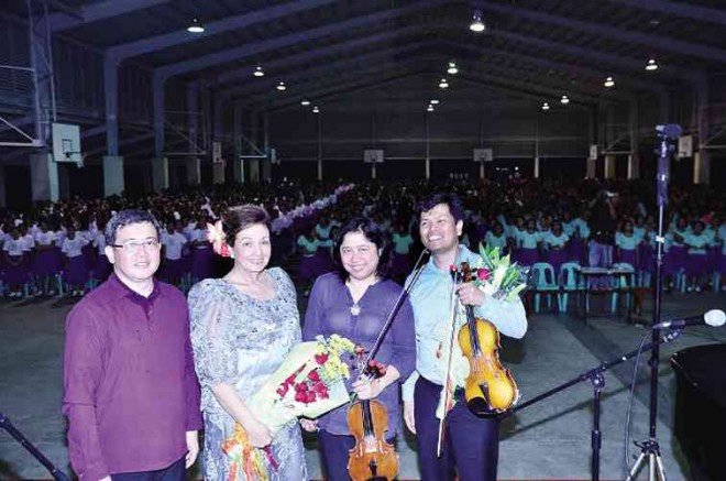 CONDUCTOR Arturo Molina, pianist Ingrid Sala Santamaria, concertmaster Gina Medina,MSO executive director Jeffrey Solares.