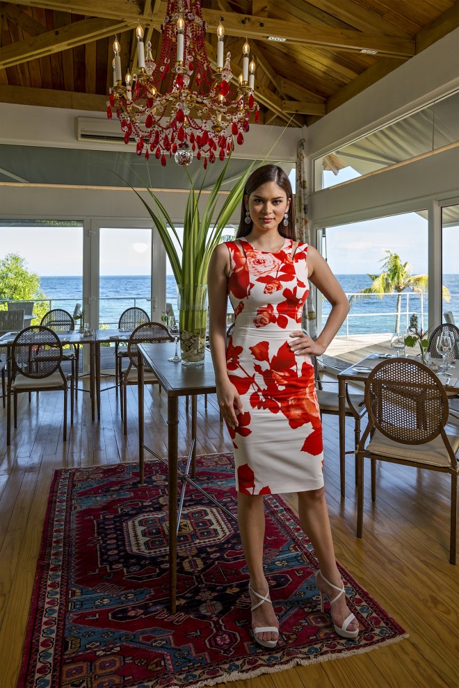 THE FINE-DINING restaurant of Tarsier Botanika is a glass structure that has a panoramic view of the sea beyond. Pia is in a floral Karen Millen.