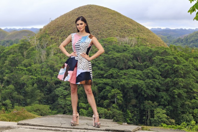 AT CHOCOLATE Hills, she is in Philosophy by Alberta Ferretti.