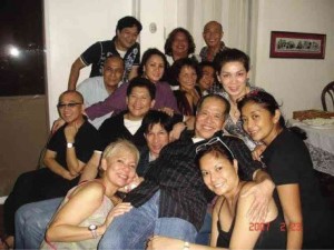 FRIENDS FOREVER. Hyatt models and designers surround their mentor-tormentor Gary Flores in 2007.
