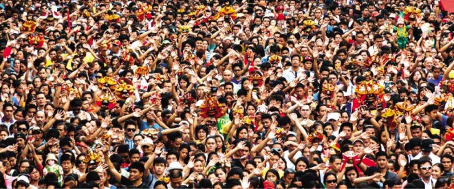PHOTO of Santo Niño fiesta by Angelo Bacani, used on the cover of the commemorative book “Kaplag 2015,” published by the Augustinian Province of SantoNiño de Cebu-Philippines and launched on April 20 at SM City Cebu