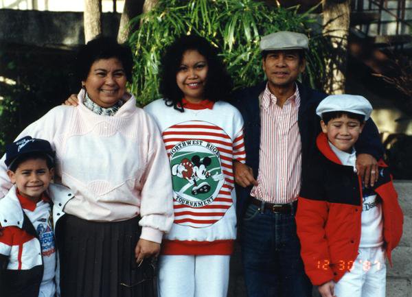 Mike with his brother Brian, mom Genie and grandparents. "Proof that I'm Filipino," he said.
