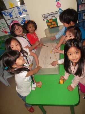 MI preschool kids enhance their people smart skill by working together in projects. CONTRIBUTED PHOTO