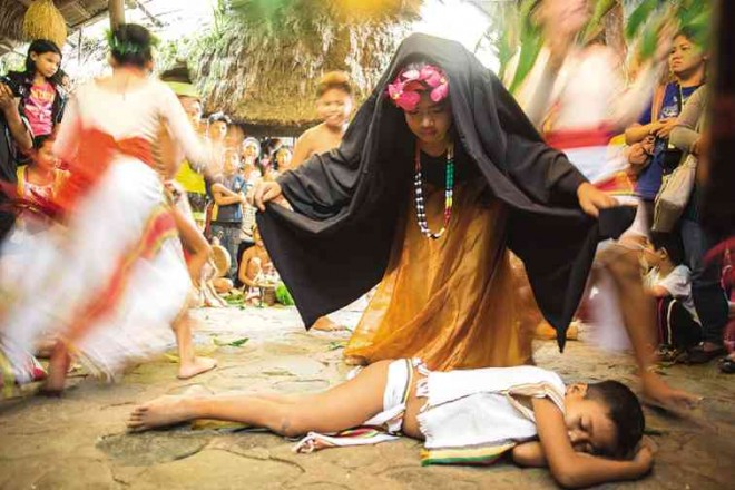 TRADITIONAL dance incorporates Ifugao community ritual. 