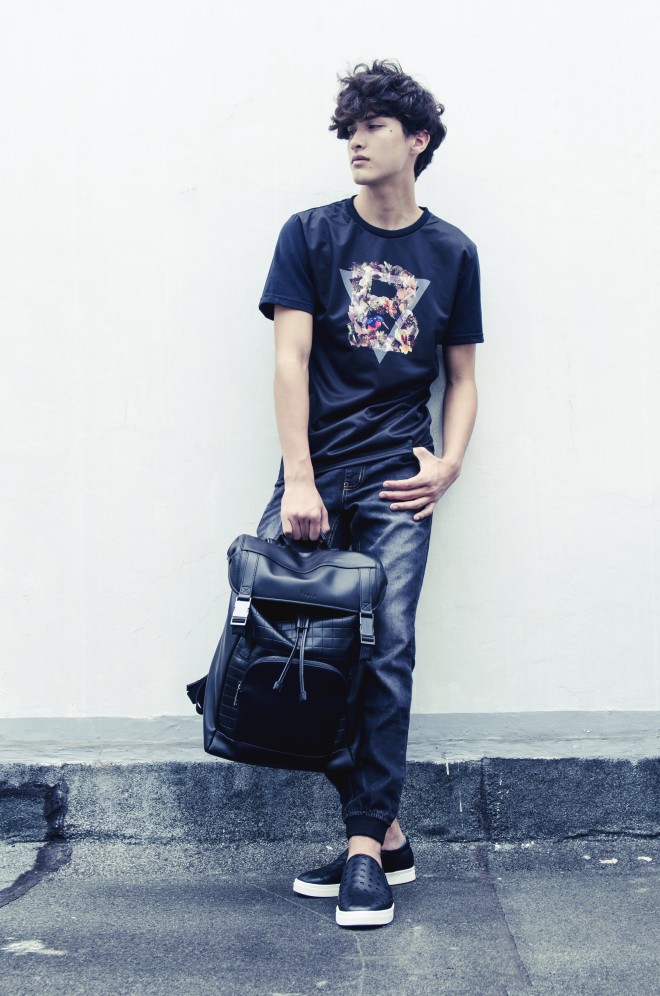 FLORAL graphic tee and denim joggers, Bench; leather Haversack and black slip-ons, Pedro