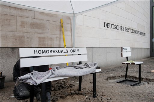 A bench with the writing "Homosexuals Only" stands in front of the German Historical Museum in Berlin, Wednesday, June 24, 2015. Germany's main national history museum on Wednesday launched an exhibition tracing 150 years of gay history in the country, including the first uses of the term "homosexual," the brutal Nazi-era repression of gays and gradual moves toward legal equality starting in the 1960s. AP