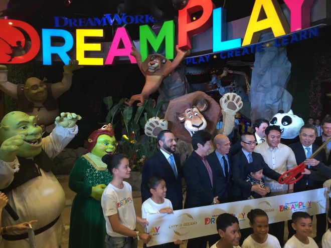 Mr. Lawrence Ho, co-chairman and CEO of Melco Crown Entertainment, and DreamWorks Animation Chief Executive Officer Jeffrey Katzenburg, cut the ribbon to formally open DreamWorks by DreamPlay flanked by famous DreamWorks characters Shrek and Fiona, Master Po from Kung Fu Panda, and Alex the Lion from Madagascar. Photo by Marc Cayabyab