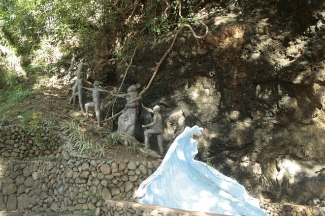 Carved on the foot of the mountain, these sculptures depict what the residents did during the time a strong typhoon surge hit Baler.