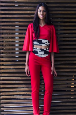 RED NEOPRENE crop top with 3/4 kimono sleeves and semicircleprinted cotton fabric, red neoprene skinny pants with waistband and semicircle-printed cotton fabri
