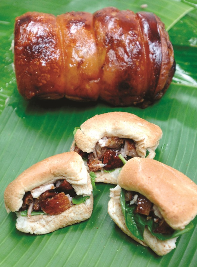 OUR favorite way to eat lechon belly: stuffed inside warm pan de sal. PHOTOS BY ROMY HOMILLADA