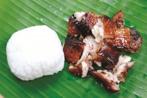 ENJOY lechon belly with steamed rice.