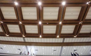 BRIGHT lights enhance the natural blond color of the ceiling that was stripped of dark-brown paint.