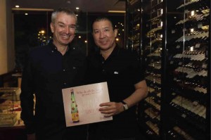 TWELFTH-GENERATION wine producer Etienne Hugel of Hugel et Fils from Alsace, France, with Romy Sia, managing director of Planet Grapes