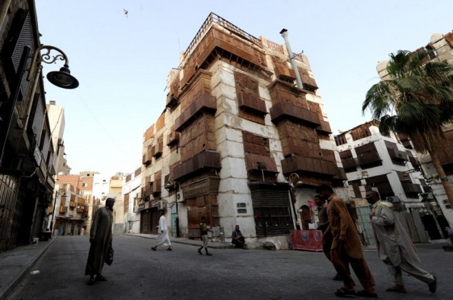 Historical buildings are seen in the UNESCO-listed heritage site in the Saudi Red Sea city of Jeddah on July 7, 2015. Residents of the Saudi Red Sea city of Jeddah are slowly returning to its historic centre, where a Ramadan cultural festival and UN heritage status are giving new life to the old quarter.  AFP PHOTO / AMER HILABI