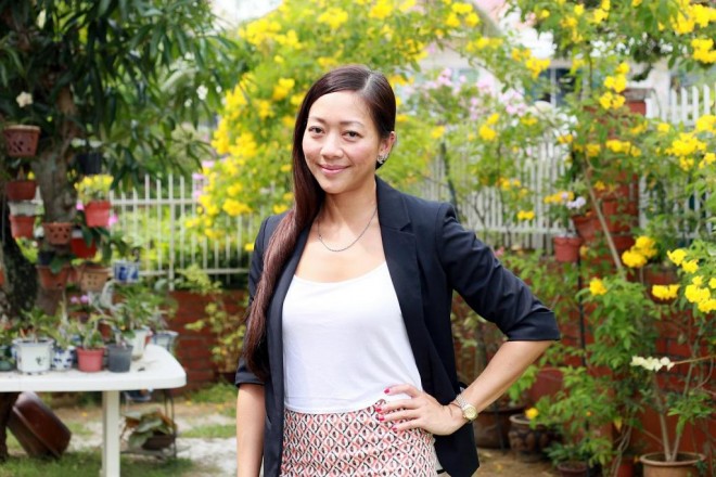 Ng Ping Ping, 37, says part of the reason she is single is because she is tall, especially in heels, and guys have told her they feel scared to approach her.PHOTO: MIKE LEE FOR THE STRAITS TIMES