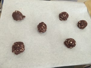 ARRANGE in cookie sheets lined with baking parchment, leaving about two inches of space between cookies as allowance for spreading.