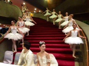 AUSTRALIAN Conservatoire of Ballet's Benjamin Ella and Akane Takada with a young ensemble