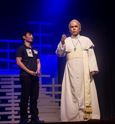 Patrick Libao as honest airport janitor Ronald Gadayan and Vincent Tañada as Pope Francis.  PHOTO FROM PHILIPPINE STAGERS FOUNDATION