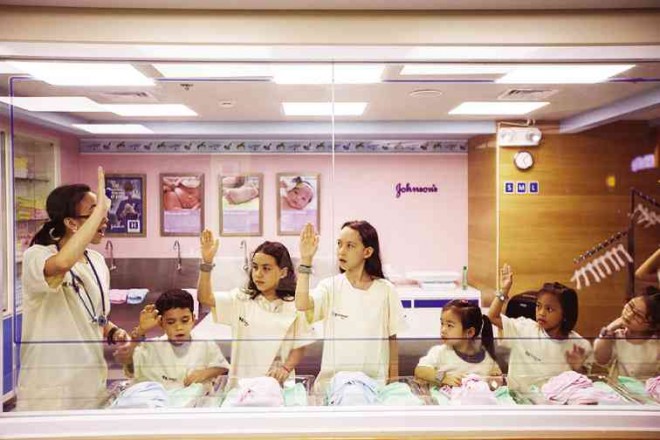 IN THE MOCK hospital nursery, kids learn about premature birth and the purpose of an incubator. PHOTOS BY JILSON SECKLER TIU