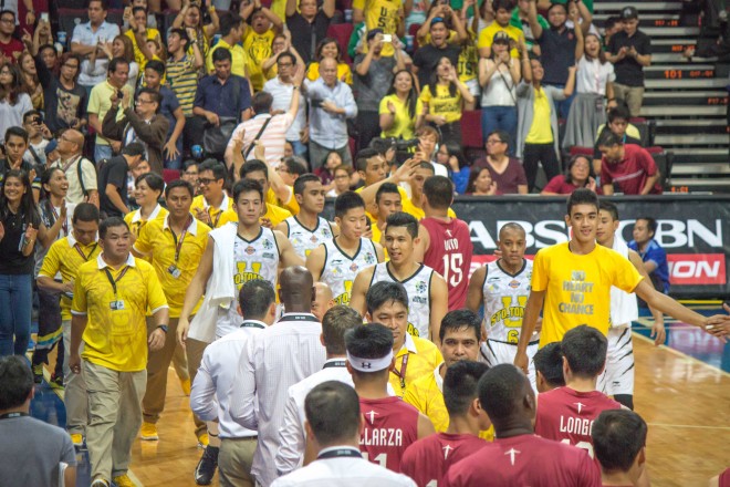 UST GROWLING Tigers after beating UP ANGELO GONZALEZ
