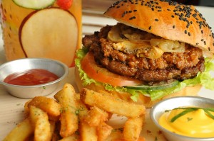 BIG BIRD Burger is a bestseller. It is served with french fries.