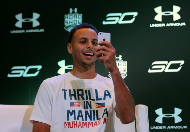 THE MVP takes a photo of the crowd at the press conference. Curry is thrilled with the support that poured from Filipino fans and promises to return to the Philippines.