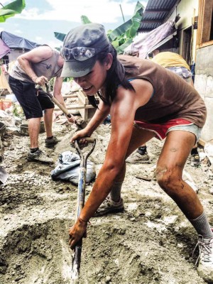 CHUCKING city life for volunteer manual labor in Leyte PHOTOS COURTESY OF MIA TENGCO