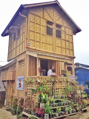 The finished structure stands in Barangay 83-C, Tacloban, Leyte. The weather-proof house was designed by a volunteer.