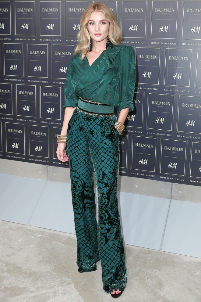 BRITISH model and actress Rosie Huntington-Whiteley attends the Balmain x H&M Collection launch .