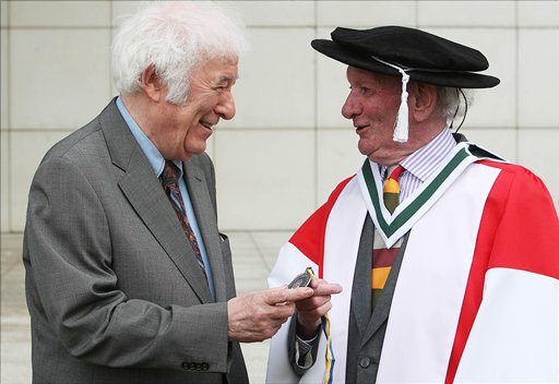 This is a June 16, 2009 file photo of playwright Brian Friel, right, holding his University College Dublin Ulysses Medal, with Irish poet Seamus Heaney in Dublin. Authorities say Brian Friel, the Tony Award-winning playwright who created ``Dancing at Lughnasa’’ and more than 30 other plays, has died at the age of 86. The Arts Council of Ireland says in a statement that Friel died Friday Oct. 2, 2015. The cause of death was not given. AP 
