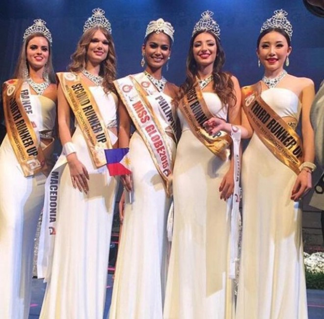Ann Lorraine Colis (center) is flanked by her runners-up at the Miss Globe 2015 pageant in Canada. PHOTO FROM THE BINIBINING PILIPINAS FACEBOOK PAGE