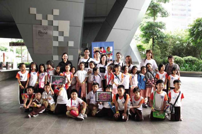 Grade 3 students of Sto. Rosario Elementary School in Pateros, Rizal, at the Mind Museum in Bonifacio Global City, Taguig