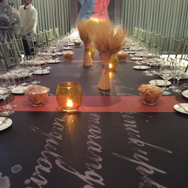 PANATANG Makabayan is written in long script on table cover of the dining tables.