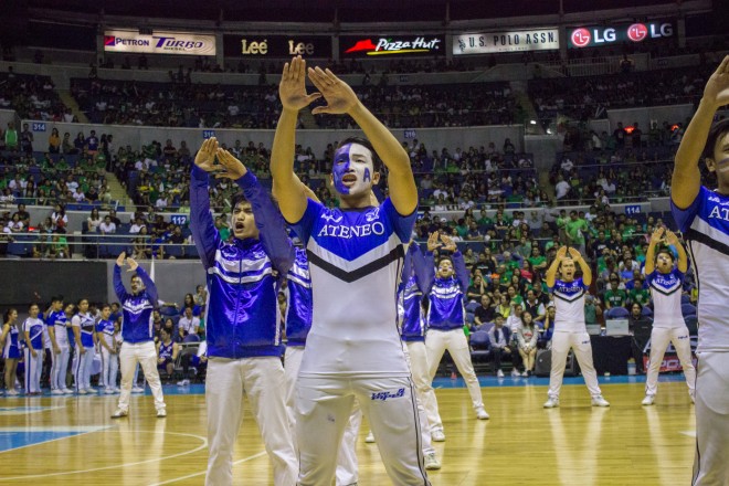 THE ATENEO Blue Babble Battalion and stunt lifters doing the traditional cheers together ANGELO GONZALEZ