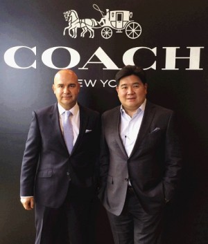 ANDREW Stanleick, president and CEO of Coach in SEA and Oceania, and SSI Group president Anton T. Huang. PHOTO: CHECHE V. MORAL