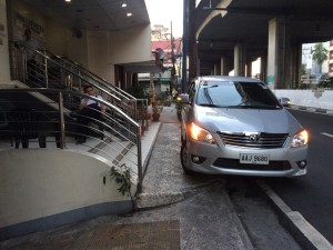 ASSIGN designated parking for cars—and get them off sidewalks.