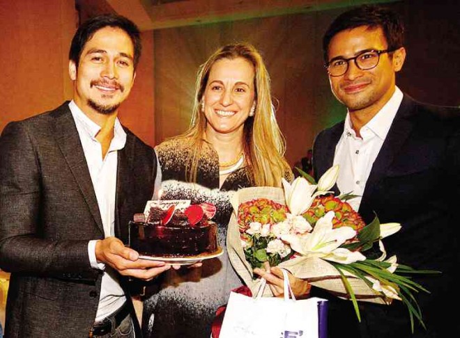 BIRTHDAY girl Sofia Zobel-Elizalde is greeted by two famous and good-looking well-wishers: Piolo Pascual and Sam Milby.