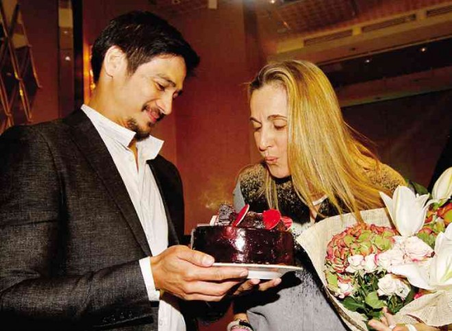 SOFIA Zobel-Elizalde, with Piolo Pascual, makes awish before blowing her birthday cake.