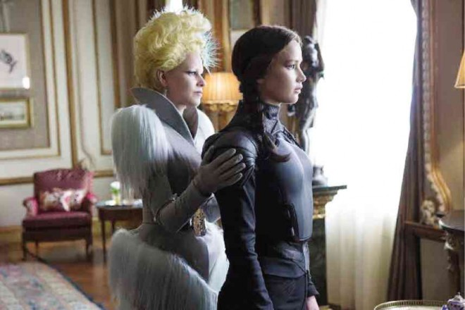 JENNIFER Lawrence (right) reprises her role as Katniss Everdeen.