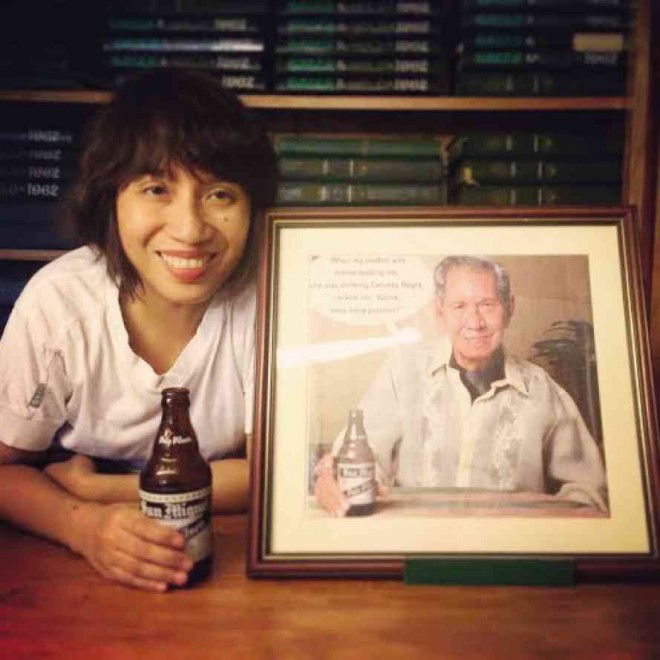 FILMMAKER Sari Dalena with a portrait of her Uncle Nick holding a familiar bottle.
