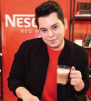 RAYMOND Gutierrez with his Vanilla Chilled Coffee