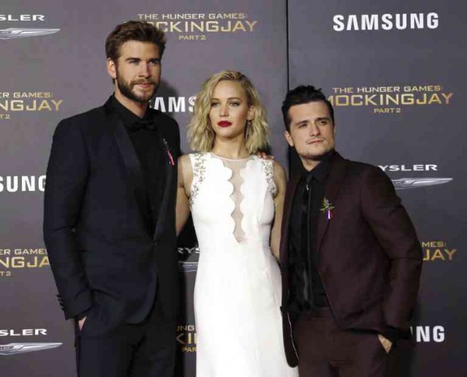 ACTORS Liam Hemsworth, Jennifer Lawrence and Josh Hutcherson during the premiere of “The Hunger Games: Mockingjay, Part 2” in Los Angeles. AFP