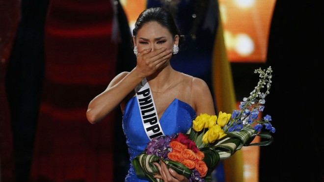 Miss Philippines Pia Alonzo Wurtzbach reacts as she was announced as the new Miss Universe at the Miss Universe pageant on Sunday, Dec. 20, 2015, in Las Vegas. Miss Colombia Ariadna Gutierrez was incorrectly named as Miss Universe before her crown was taken away. (AP Photo/John Locher)