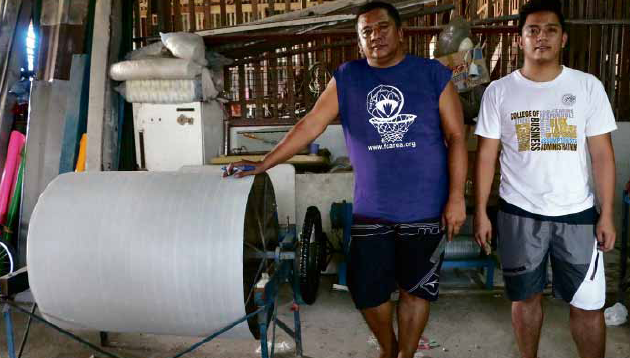 GUIDING LIGHT Eric Quiwa and son Karl Ernest, fifth and sixth generation lantern makers, work on the craft began by their great-grandfather Francisco Estanislao, who started the business in 1908. E.I. REYMOND T. OREJAS/CONTRIBUTOR