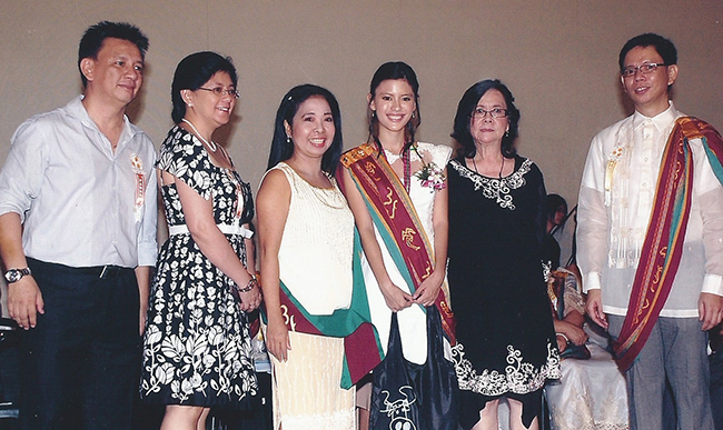 THE AUTHOR (fourth from left) at her graduation