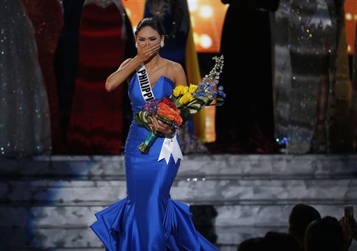 Miss Philippines Pia Alonzo Wurtzbach reacts as she was announced as the new Miss Universe at the Miss Universe pageant on Sunday, Dec. 20, 2015, in Las Vegas. Miss Colombia Ariadna Gutierrez was incorrectly named as Miss Universe before her crown was taken away. AP PHOTO